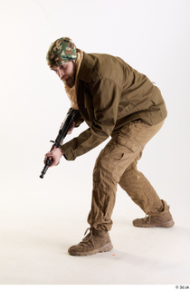 Andrew Elliott Pose with Gun aiming gun crouching standing whole…